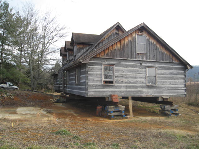 Farmhouse Basic Collection log cabin on trailer
