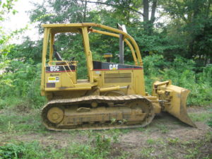 Clearing the land with heavy equipment