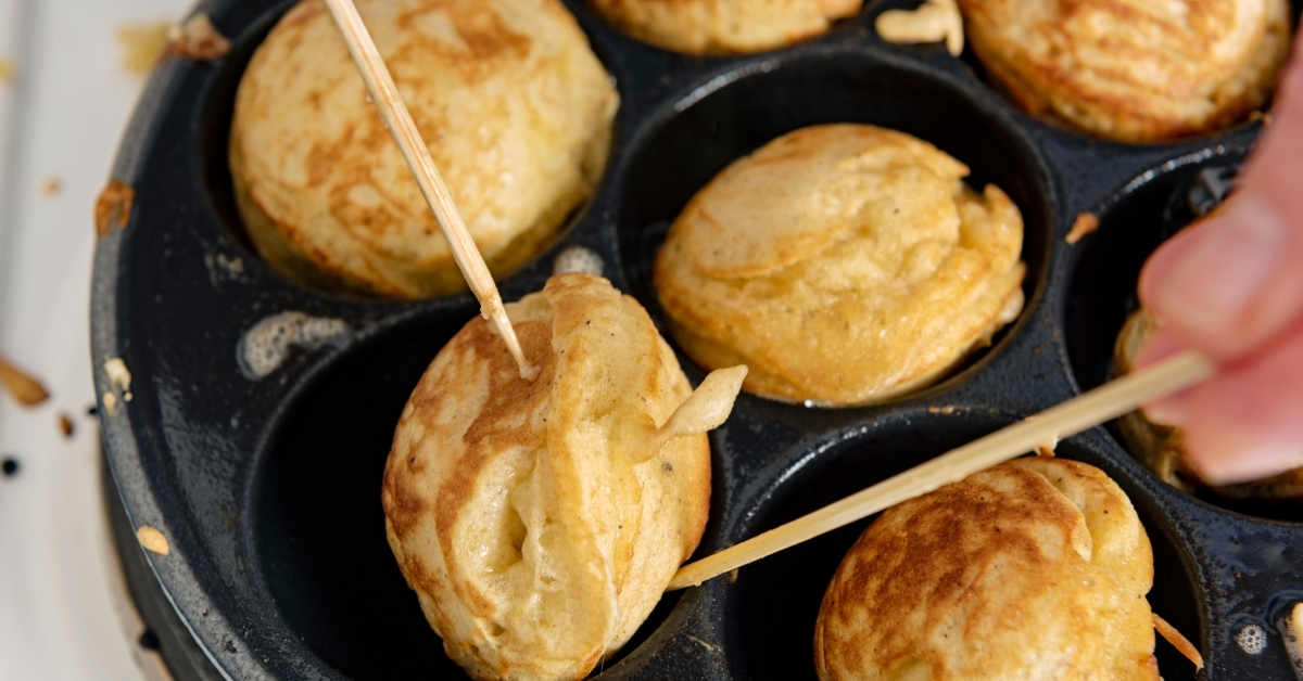 The history of the Aebleskiver pan originated in Denmark.