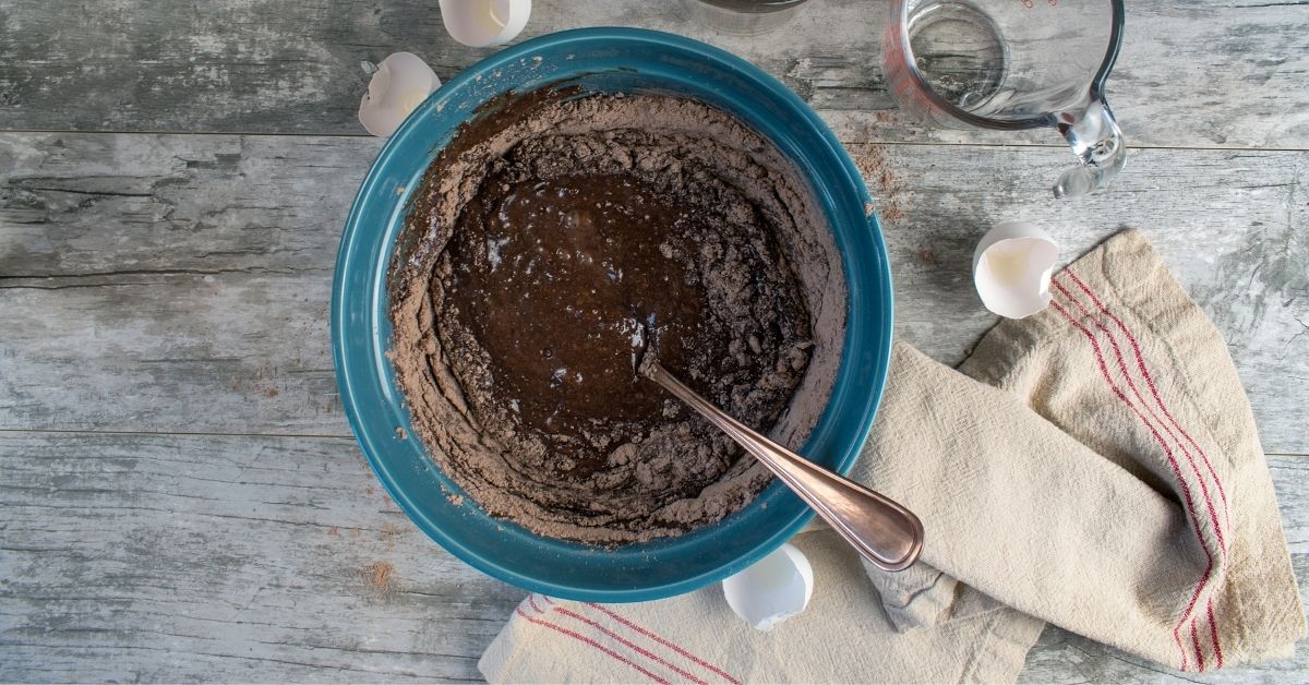 Mixing all the ingredients to make one bowl brownies for baking