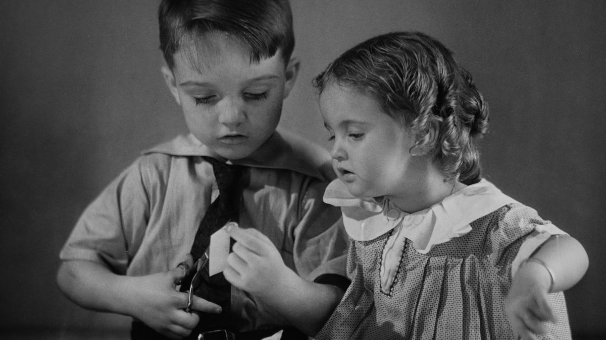 Children using safety scissors